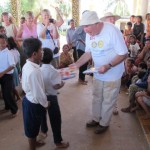 Rotarians sharing school supplies