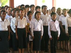 Singing the Khmer national anthem.