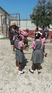 Caroline playing hokey pokey at recess.