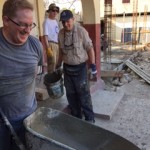 Paul laughing while he works
