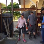 Mary carrying cement for the floor
